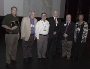 Officials from the city of Jacksonville receiving their re-certification award.